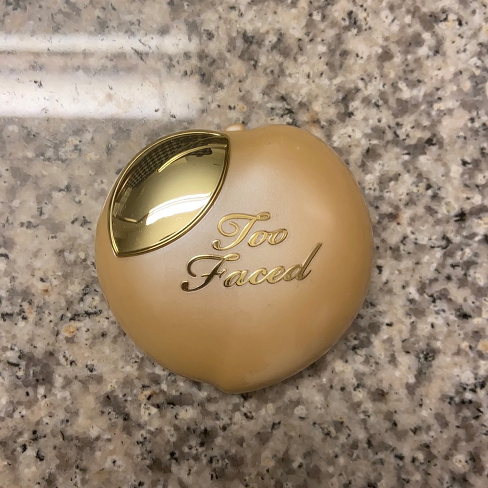 Too faced peach frost melting powder highlighter